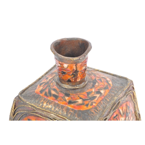 344 - An early 20th century Middle Eastern influence enamelled brass vase. The vase having a square base, ... 