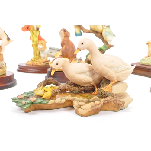 346 - Aynsley Master Craft/ Border Fine Arts - A collection of vintage 20th century resin figures / statue... 