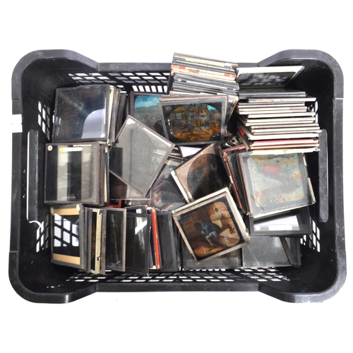 364 - A large collection of vintage 20th century (possibly earlier) magic lantern slides. To include colou... 