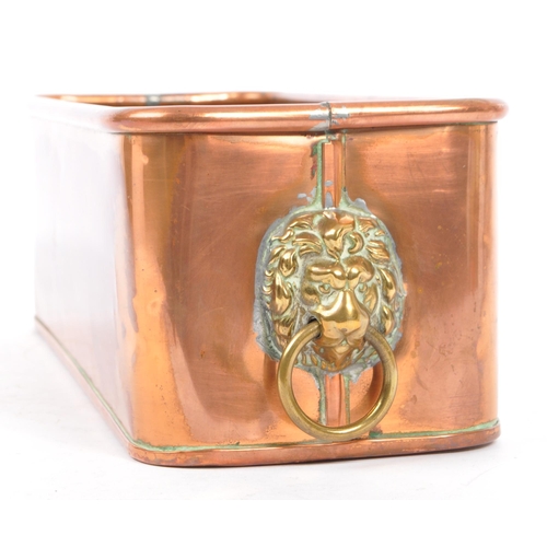 366 - A 19th century Victorian copper lion's head planter. The planter of rectangular form, with a rolled ... 