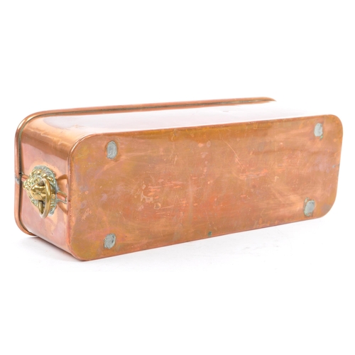 366 - A 19th century Victorian copper lion's head planter. The planter of rectangular form, with a rolled ... 