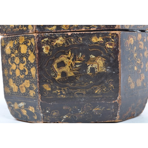 367 - A 19th century Chinese Cantonese black lacquered tea caddy box. The box having a black lacquered fin... 