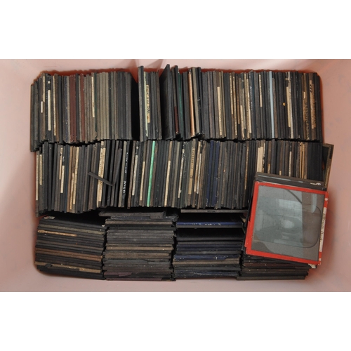 368 - A large collection of 19th century and later magic lantern slides. To include colour and black and w... 