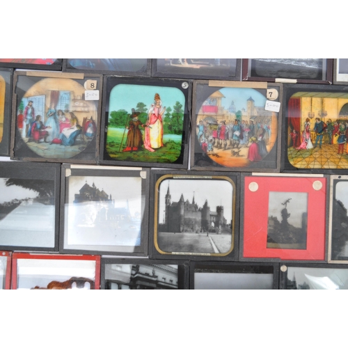 370 - A large collection of 19th century and later magic lantern slides. To include colour and black and w... 