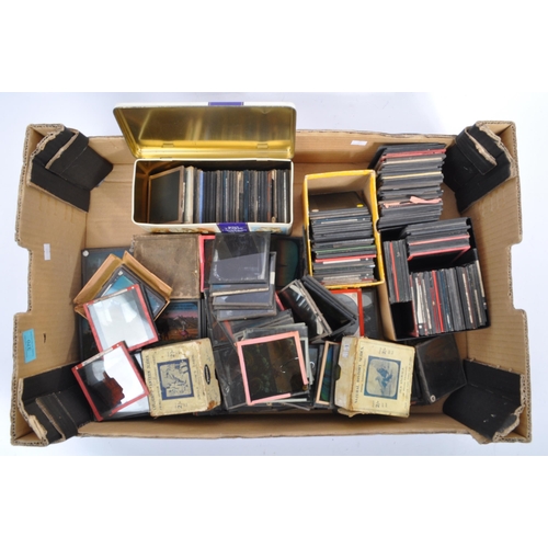 370 - A large collection of 19th century and later magic lantern slides. To include colour and black and w... 