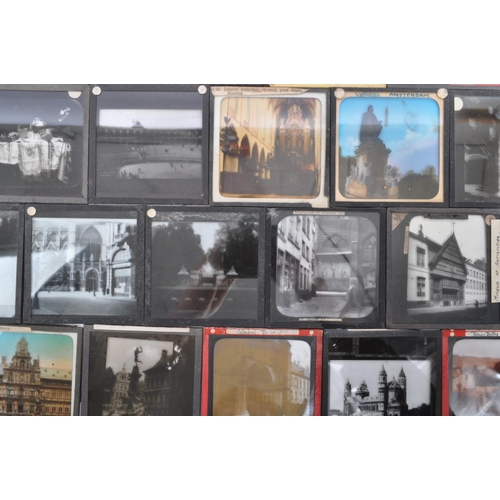 370 - A large collection of 19th century and later magic lantern slides. To include colour and black and w... 