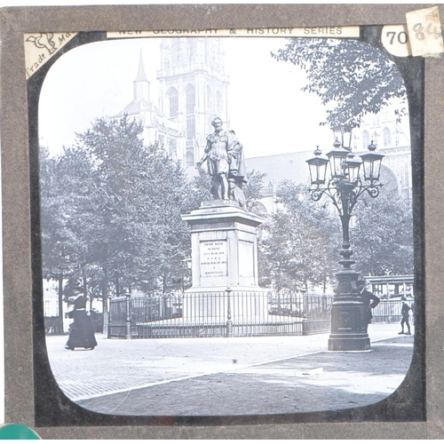 370 - A large collection of 19th century and later magic lantern slides. To include colour and black and w... 