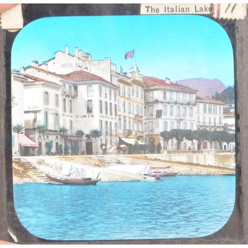 371 - A collection of 19th century and later magic lantern slides. To include colour and black and white e... 