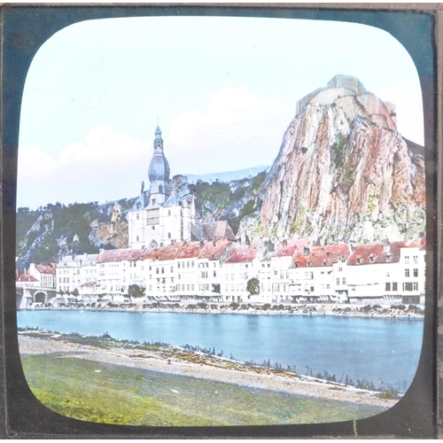 373 - A collection of 19th century and later Magic Lantern slides. To include colour and black and white e... 