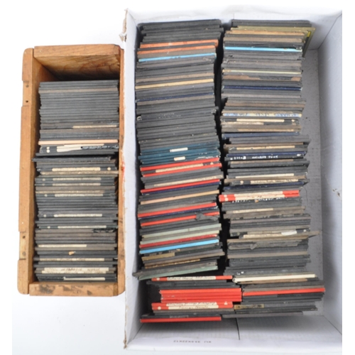 373 - A collection of 19th century and later Magic Lantern slides. To include colour and black and white e... 