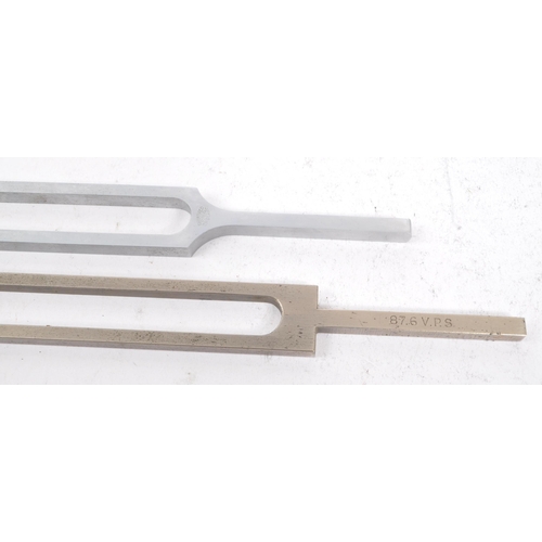 374 - Two vintage 20th century tuning forks. A acoustic resonator in the form of a two-pronged fork with t... 