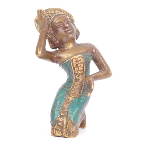 377 - A 20th century bronze Balinese Dewi Tara figure. The figure in the form of a kneeling goddess / deit... 