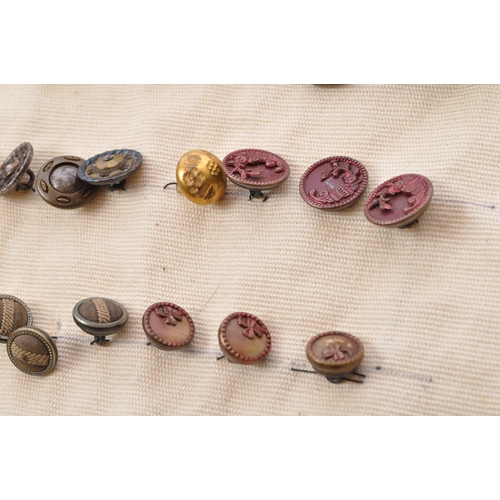 378 - An assorted collection of antique Victorian, Georgian and later 20th century buttons and buckles. Th... 