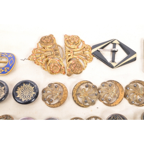 378 - An assorted collection of antique Victorian, Georgian and later 20th century buttons and buckles. Th... 