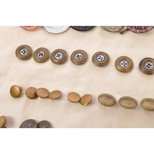 378 - An assorted collection of antique Victorian, Georgian and later 20th century buttons and buckles. Th... 