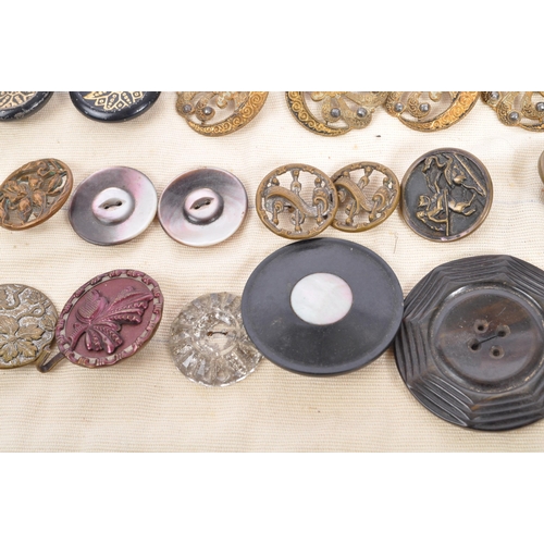 378 - An assorted collection of antique Victorian, Georgian and later 20th century buttons and buckles. Th... 