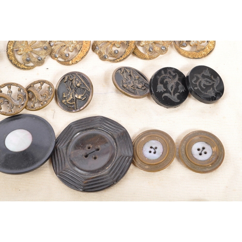 378 - An assorted collection of antique Victorian, Georgian and later 20th century buttons and buckles. Th... 