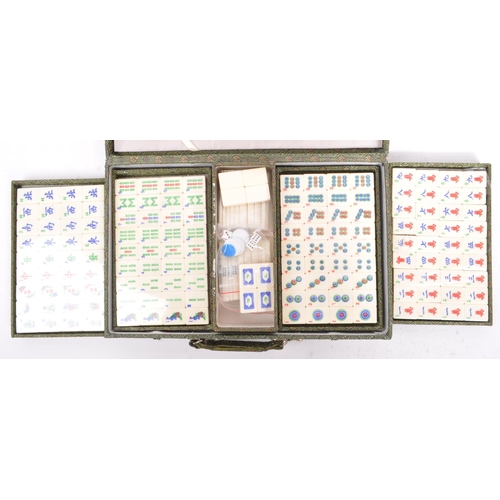 381 - A contemporary Mah Jong Chinese board game. Having counters and stick, some still in cellophane. Wit... 