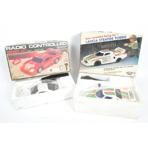 385 - Motor Racing Interest - Two late 20th century RC radio controlled Ferrari and Lancai race car toys. ... 