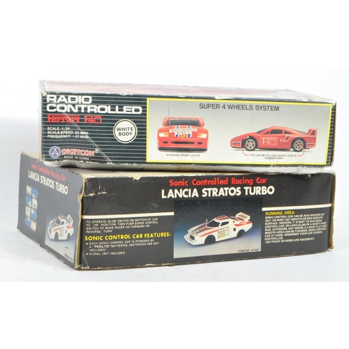 385 - Motor Racing Interest - Two late 20th century RC radio controlled Ferrari and Lancai race car toys. ... 