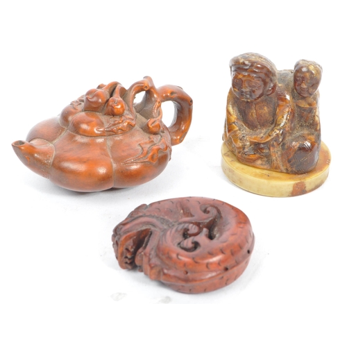 386 - A collection of late 19th century Japanese netsuke carved fruit wood figures. Comprising of a teapot... 