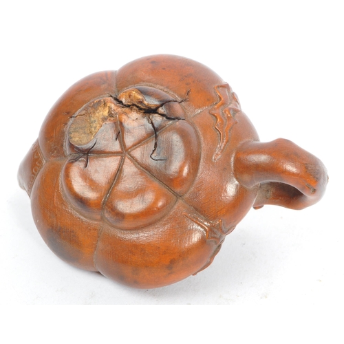 386 - A collection of late 19th century Japanese netsuke carved fruit wood figures. Comprising of a teapot... 