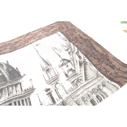 389 - A vintage 20th century Jacqmar silk scarf neckerchief. With architectural building to central panel,... 