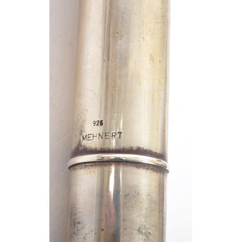 401 - A late 20th century circa. 1980s Pearl NS-97E 925 sterling silver flute. The musical instrument wood... 