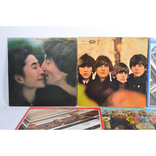 404 - The Beatles - A collection of six vintage 20th century LP long play vinyl record albums by The Beatl... 