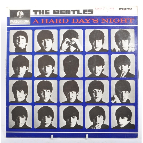 408 - A collection of five mid 20th century The Beatles 45 rpm vinyl records LPs. The collection to includ... 