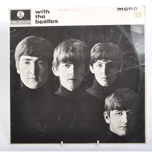 408 - A collection of five mid 20th century The Beatles 45 rpm vinyl records LPs. The collection to includ... 