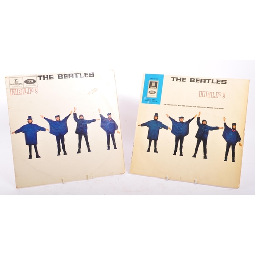 408 - A collection of five mid 20th century The Beatles 45 rpm vinyl records LPs. The collection to includ... 