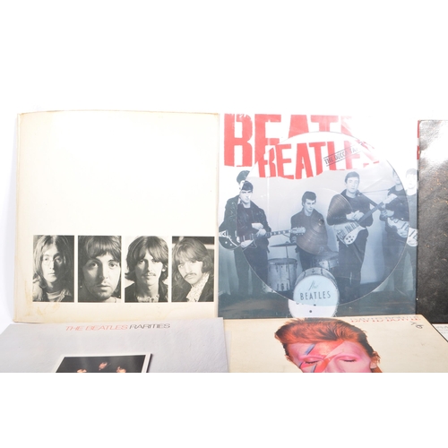 412 - A collection of 20th century 45rpm vinyl records LPs. The collection to include Saved - Bob Dylan, R... 