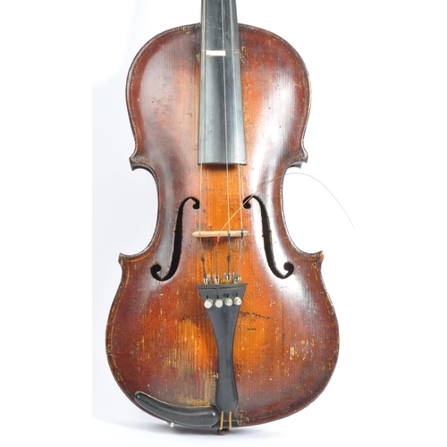 425 - A late 19th century circa 1890s violin, alongside another late 20th century example. The violin of w... 