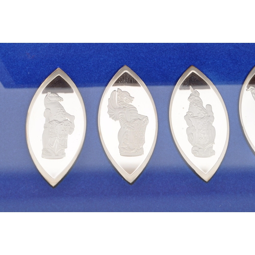 443 - A boxed set of ten Sterling Silver lozenge shaped white metal ingots titled 'The Queens Beasts' - pr... 