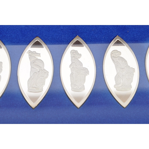 443 - A boxed set of ten Sterling Silver lozenge shaped white metal ingots titled 'The Queens Beasts' - pr... 