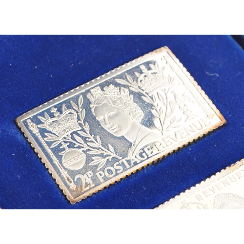 445 - A set of four silver commemorative Edition coronation enlarged proof quality silver monarch stamp in... 