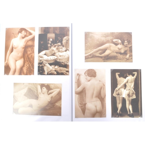 452 - A collection of thirty four 20th century French nude erotic postcards cartes erotique. Presented in ... 