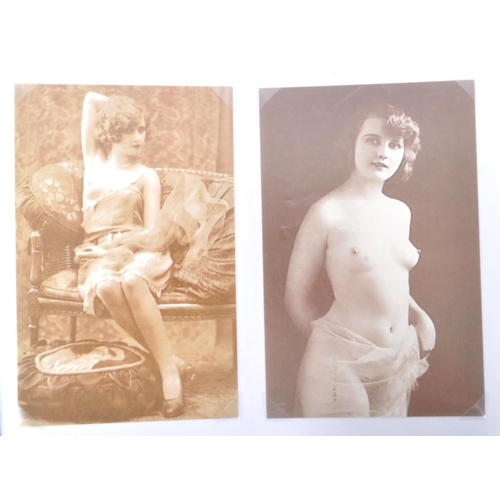 452 - A collection of thirty four 20th century French nude erotic postcards cartes erotique. Presented in ... 