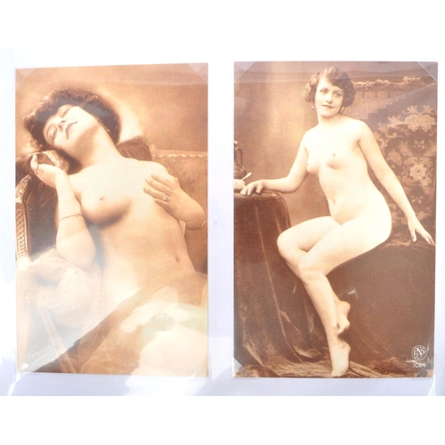 452 - A collection of thirty four 20th century French nude erotic postcards cartes erotique. Presented in ... 