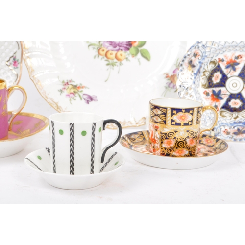 46 - A collection of 20th century china teacups, saucers, and plates. The collection to include a pair of... 