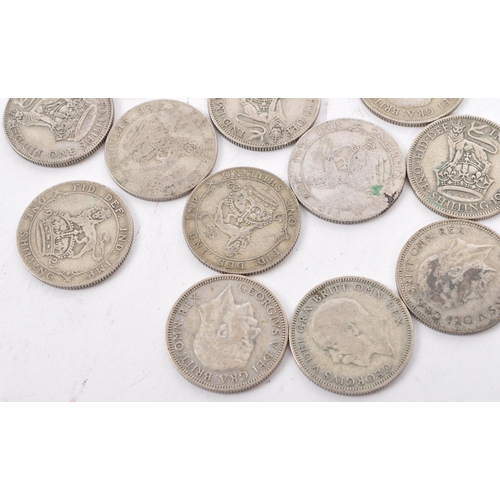 463 - A collection of approximately thirty early 20th century (pre 1947) .500 silver George V shillings. T... 