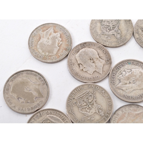 463 - A collection of approximately thirty early 20th century (pre 1947) .500 silver George V shillings. T... 