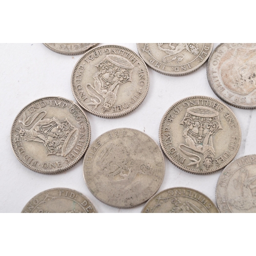 463 - A collection of approximately thirty early 20th century (pre 1947) .500 silver George V shillings. T... 