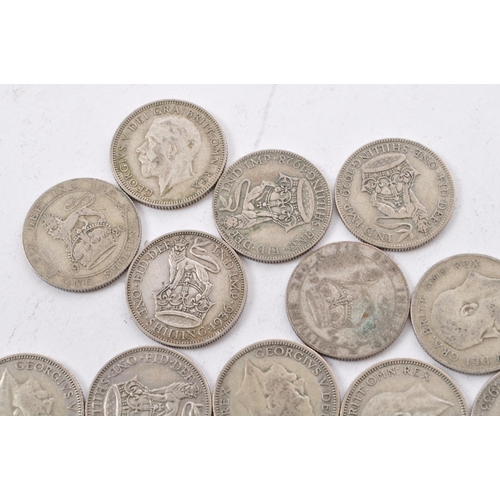 464 - A collection of approximately thirty early 20th century (pre 1947) .500 silver George V shillings. T... 