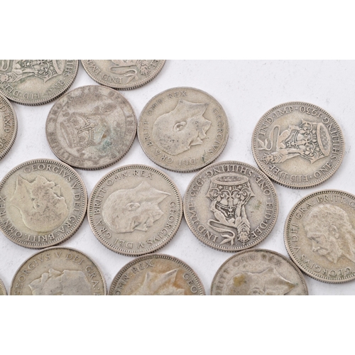 464 - A collection of approximately thirty early 20th century (pre 1947) .500 silver George V shillings. T... 