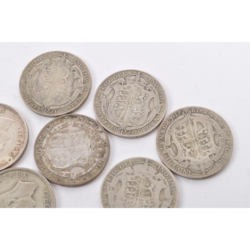 471 - A collection of five George V and three George VI circulated silver half crown coins. The lot to inc... 