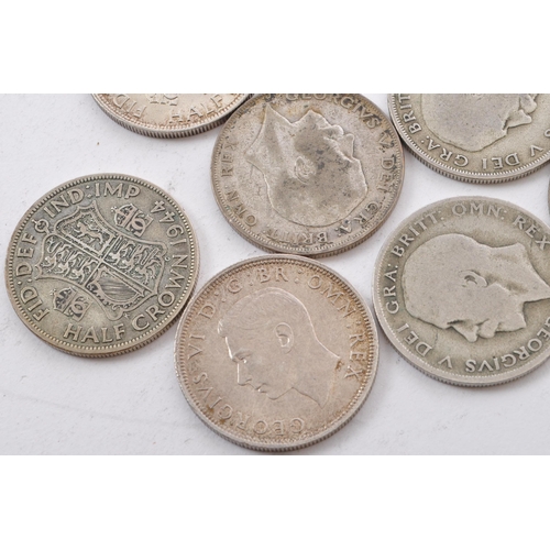 471 - A collection of five George V and three George VI circulated silver half crown coins. The lot to inc... 