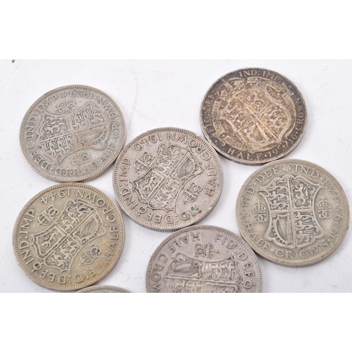 472 - A collection of five George V and three George VI circulated silver half crown coins. The lot to inc... 