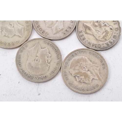 472 - A collection of five George V and three George VI circulated silver half crown coins. The lot to inc... 